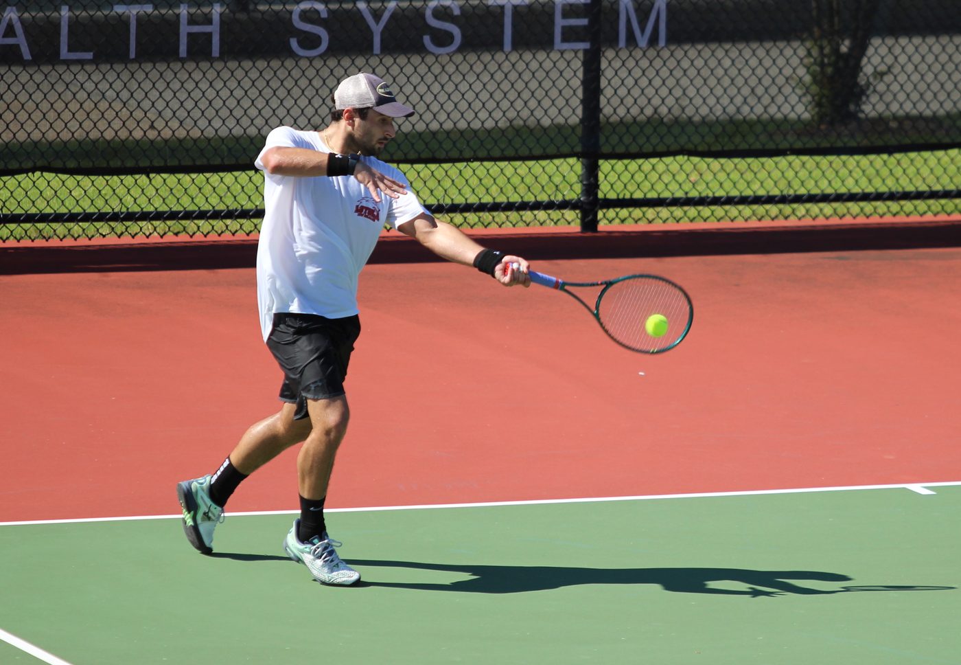 Spencer forehand red court